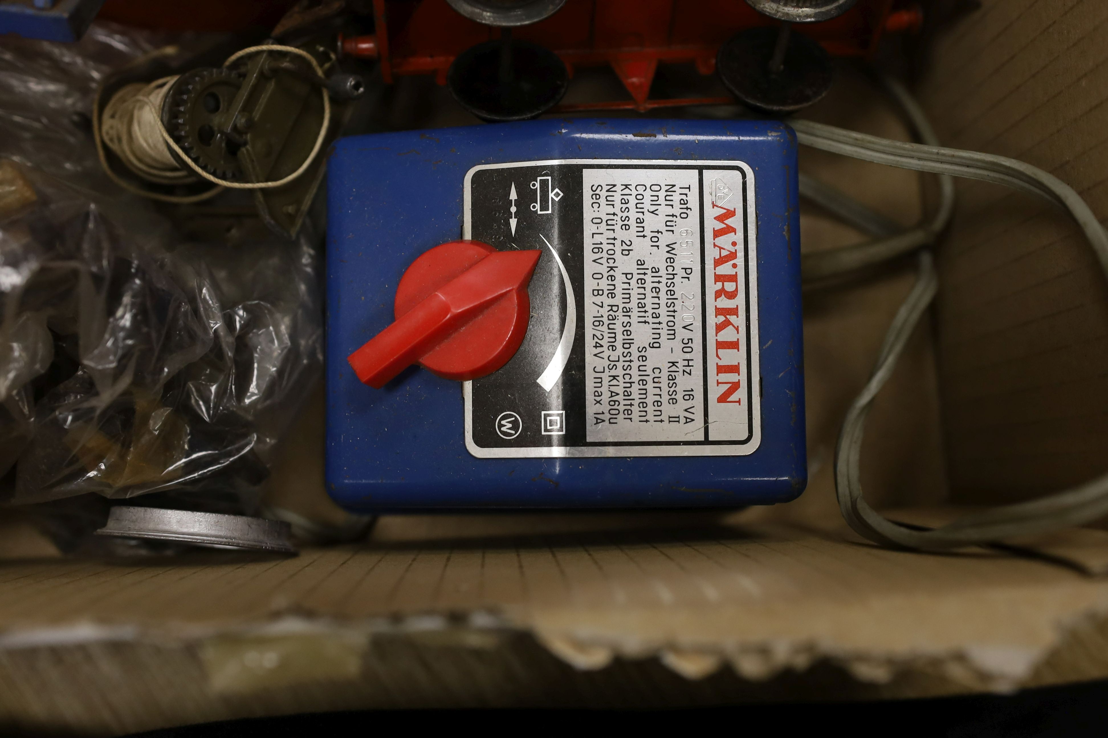 A mixed quantity of Hornby model railway track, a metal crossing, an engine and other items